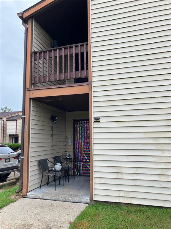 exterior space featuring a balcony and a patio area