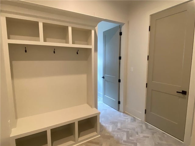 mudroom with light parquet flooring