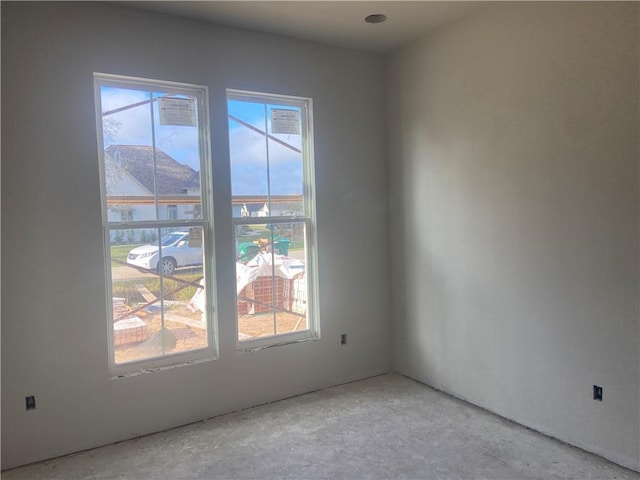 spare room featuring plenty of natural light