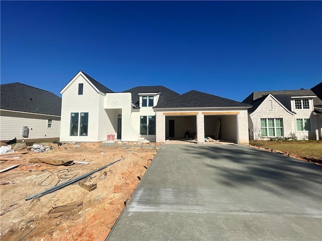 view of front of property featuring a garage