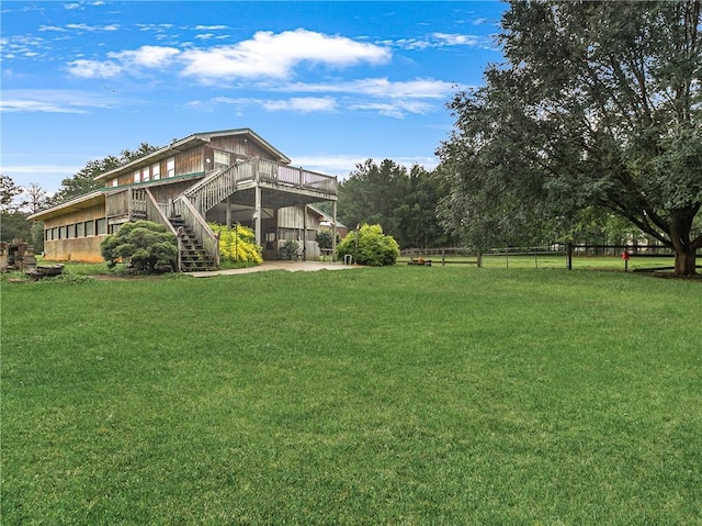 view of yard with a deck