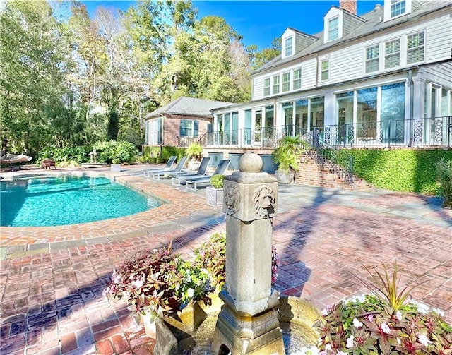 view of pool with a patio area