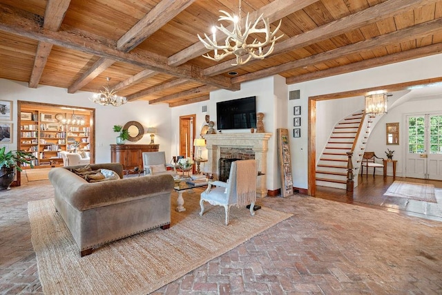 living room featuring beam ceiling and wooden ceiling