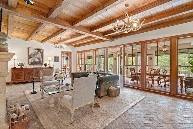 living room with beamed ceiling, wooden ceiling, and a notable chandelier