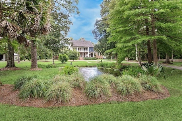 view of yard with a water view