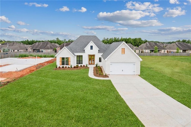 modern farmhouse with a garage and a front yard