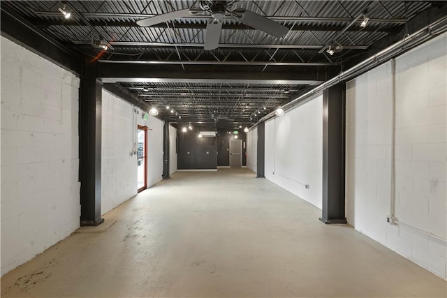 basement featuring ceiling fan