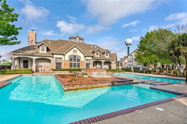 view of pool with a patio