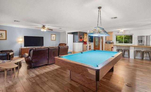 playroom with ceiling fan, billiards, wood-type flooring, and crown molding