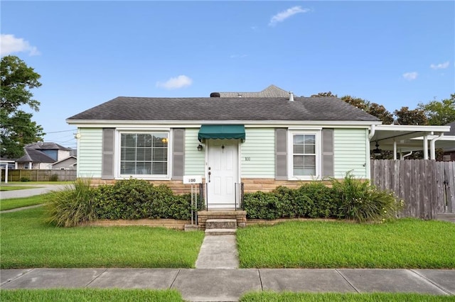 view of front of home with a front yard