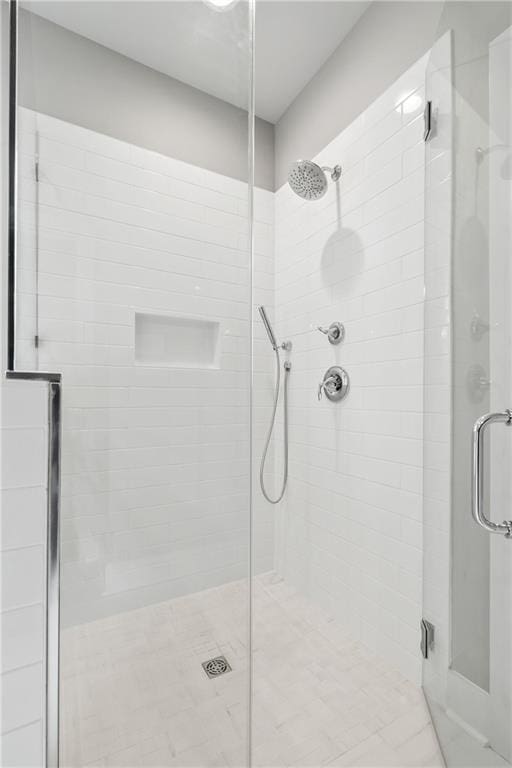 bathroom with an enclosed shower