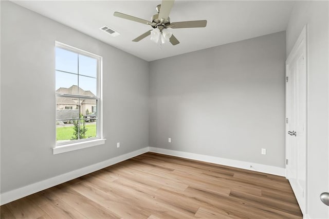 unfurnished room with light hardwood / wood-style floors and ceiling fan