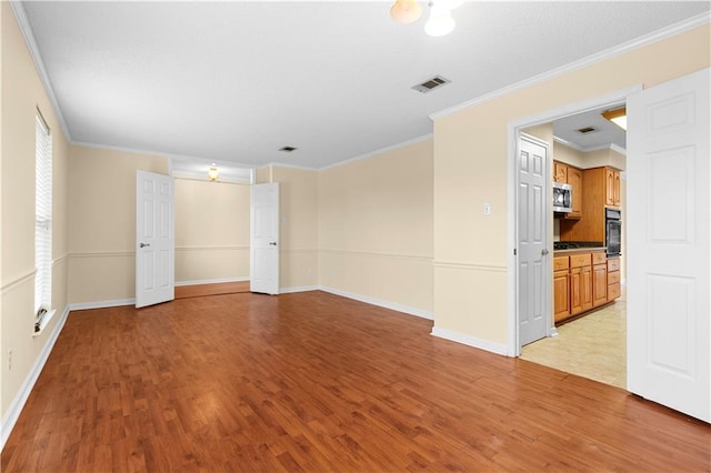 interior space featuring light tile patterned floors and ornamental molding