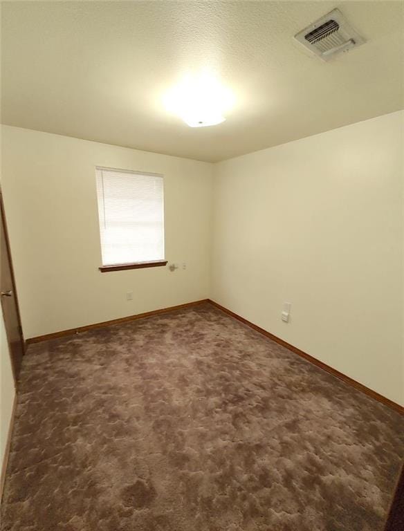 empty room featuring carpet