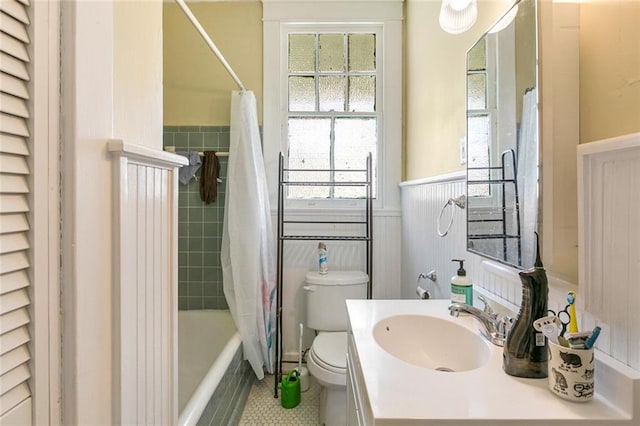 full bathroom featuring vanity, toilet, shower / bath combo, and tile patterned flooring