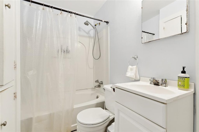 full bathroom featuring vanity, shower / bath combo, and toilet