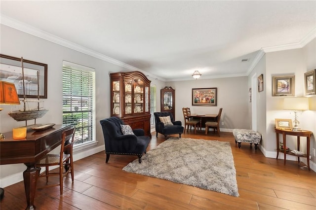 living room featuring crown molding and wood-type flooring