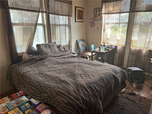 bedroom featuring hardwood / wood-style flooring