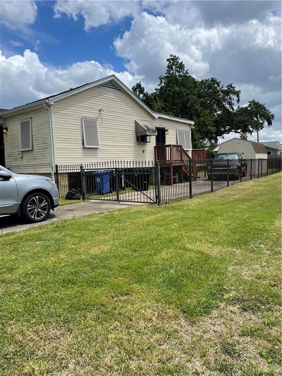 view of home's exterior featuring a lawn