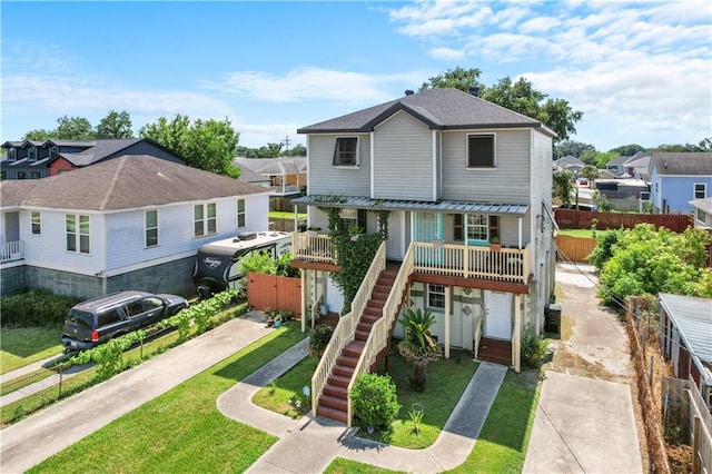 view of front facade featuring a front yard