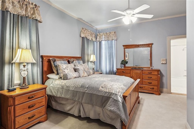 carpeted bedroom with ceiling fan and crown molding