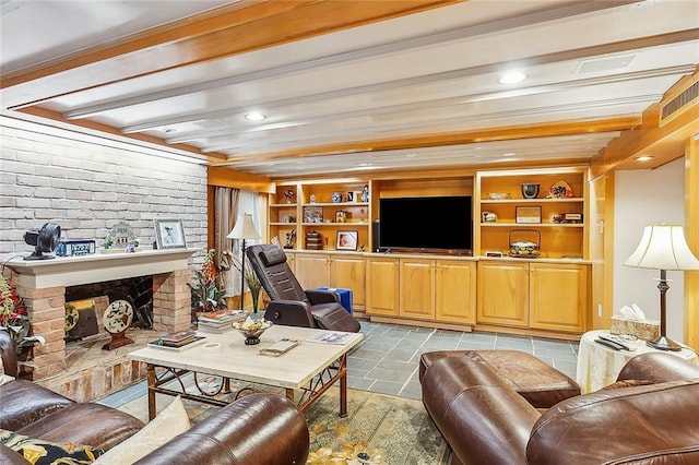 tiled living room featuring beamed ceiling, built in features, and a brick fireplace