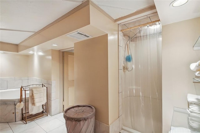 bathroom with tile patterned flooring and a shower