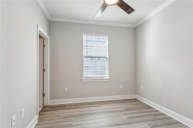 unfurnished room with light hardwood / wood-style floors, crown molding, and ceiling fan