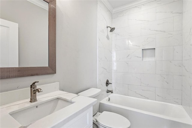 full bathroom featuring vanity, tiled shower / bath combo, toilet, and crown molding