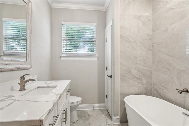 bathroom with vanity, crown molding, a bathtub, toilet, and tile patterned flooring