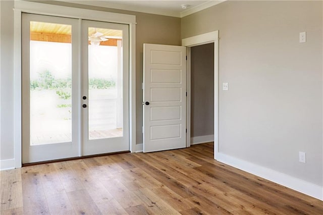 doorway to outside with hardwood / wood-style flooring, french doors, and a wealth of natural light