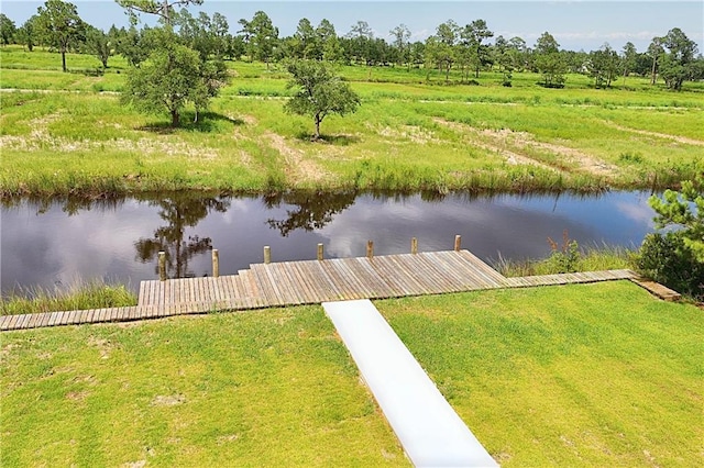 view of dock featuring a water view and a rural view