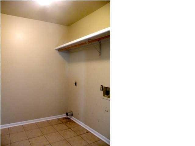 laundry room featuring light tile patterned floors, hookup for an electric dryer, and washer hookup