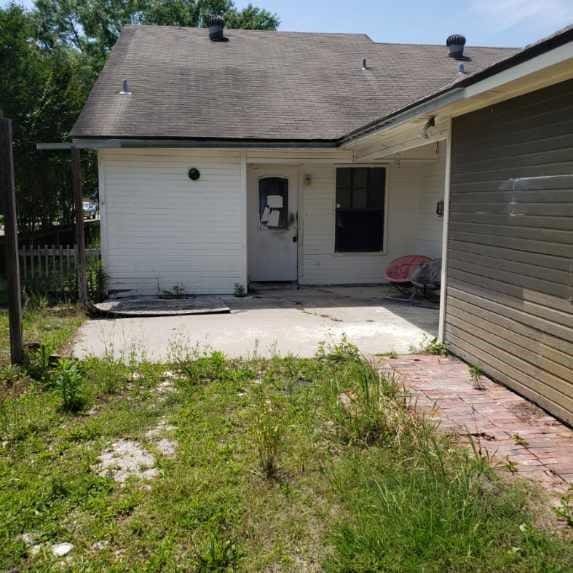117 Larry St, Lafayette, LA 70506 - exterior space with a shingled roof, a patio area, and fence
