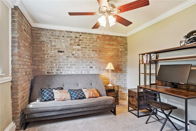 office featuring light carpet, brick wall, ornamental molding, and a ceiling fan