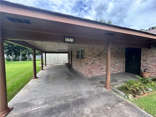 view of patio / terrace with a carport