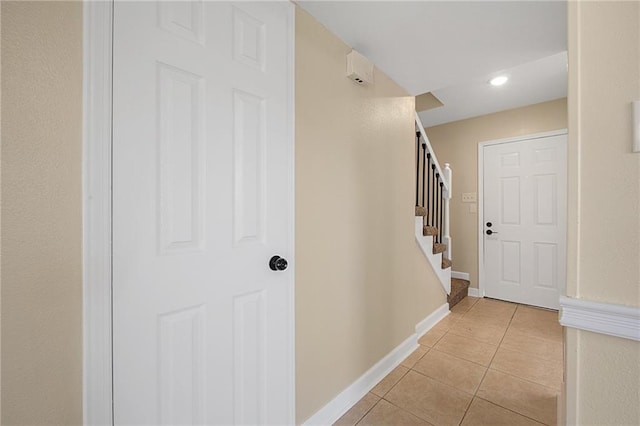 interior space featuring light tile patterned flooring