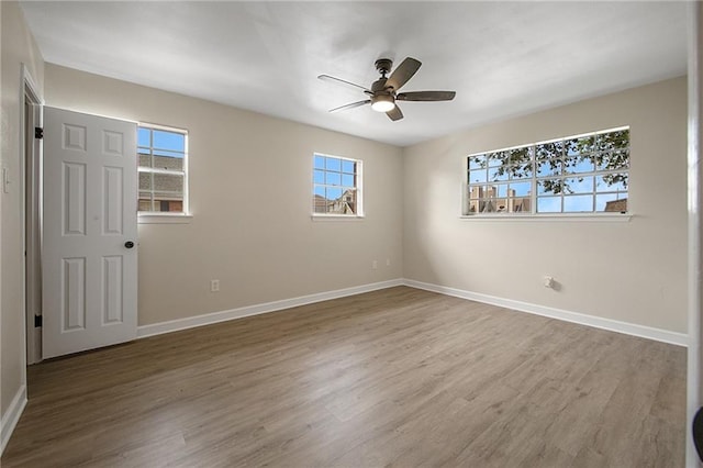 33 Brandon Hall Dr Unit A, Destrehan, LA 70047 - unfurnished room with baseboards, a ceiling fan, and wood finished floors