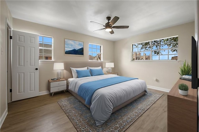 33 Brandon Hall Dr Unit A, Destrehan, LA 70047 - bedroom featuring baseboards, multiple windows, wood finished floors, and a ceiling fan