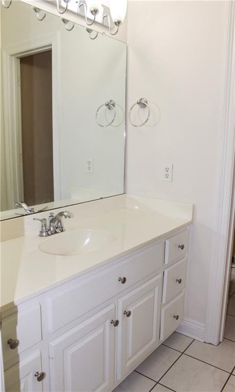 bathroom with vanity and tile patterned flooring