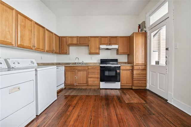 kitchen with sink, dark wood-type flooring, washing machine and dryer, and white appliances