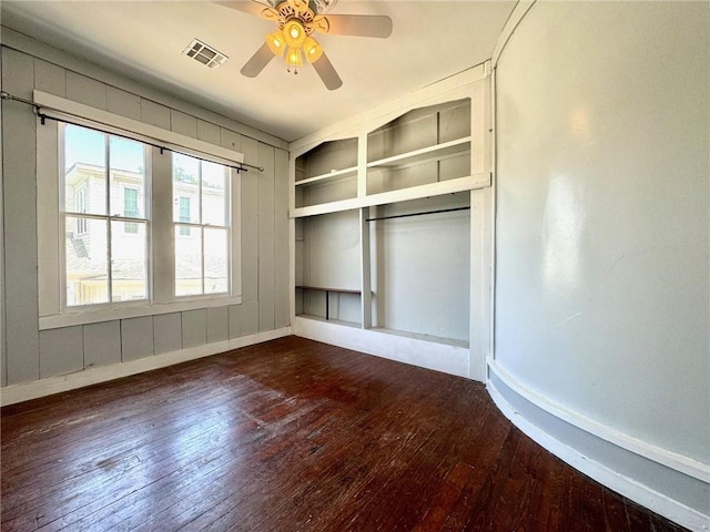 unfurnished bedroom featuring a closet, ceiling fan, and hardwood / wood-style floors