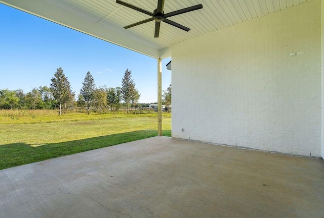 view of patio featuring ceiling fan