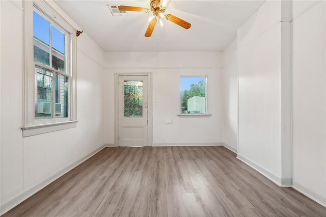 unfurnished room featuring wood-type flooring and ceiling fan