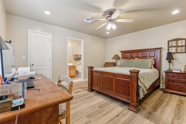 bedroom featuring light wood-type flooring, ceiling fan, and connected bathroom