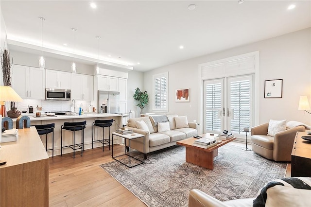 living room featuring light wood-type flooring