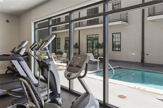 workout area featuring a wealth of natural light