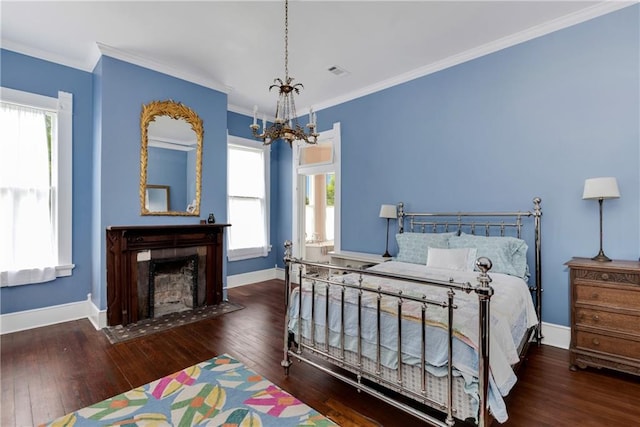 bedroom with dark wood-type flooring and ornamental molding