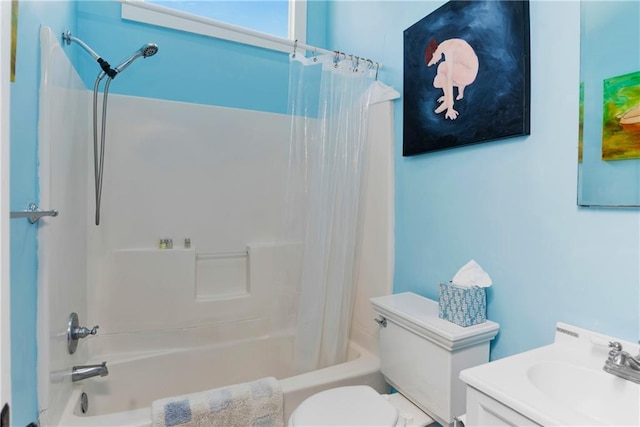 full bathroom featuring vanity, shower / tub combo, and toilet