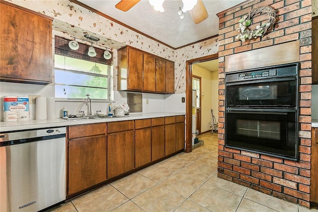 116 Villary St, Belle Chasse, LA 70037 - kitchen with stainless steel dishwasher, a sink, light countertops, light tile patterned flooring, and a textured ceiling